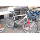 Apollo XC26 mountain bicycle with Shimano 18 speed derailleur type gears and telescopic front forks.