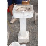 Bird bath with square column standing on a square base 32" high.