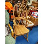 Modern stickback rocking chair Windsor style.