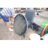 Circular glass top patio table 85cm diameter plus four matching chairs.