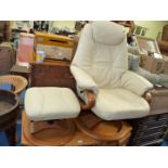 Pair of faux leather swivel chairs and matching foot stools