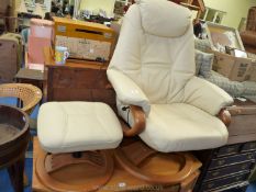 Pair of faux leather swivel chairs and matching foot stools