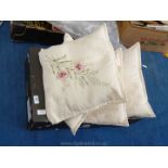 Four floral patterned cushions