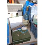 Two metal cash boxes with keys,