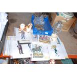 Collection of colourful military prints, camping lamp, dog figure, etc.