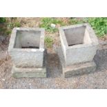 Pair of concrete square garden planters.