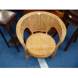 Circular bamboo and cane bedroom chair.