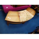 Crescent shaped seat, 45'' long x 16'' high.