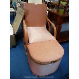 Bentwood Lloyd Loom style pink bedroom chair with matching laundry basket.
