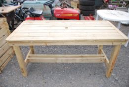 Treated wood garden table.