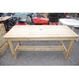 Treated wood garden table.
