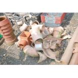 Quantity of clay drainage fittings including some plastics.