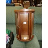 A small modern display cabinet, 18'' high x 12 1/2'' wide x 6 1/2'' deep.