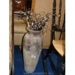 Pottery textured vase and contents
