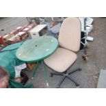 Circular metal patio table 29" wide and office chair.