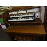 A Viscount Domus DK520 electric Organ having two 56 key manuals and 27 pedal keyboard, 38 stops,