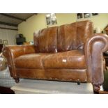 Leather two seater sofa.