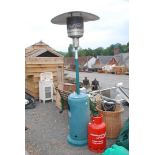 Patio heater and gas bottle.