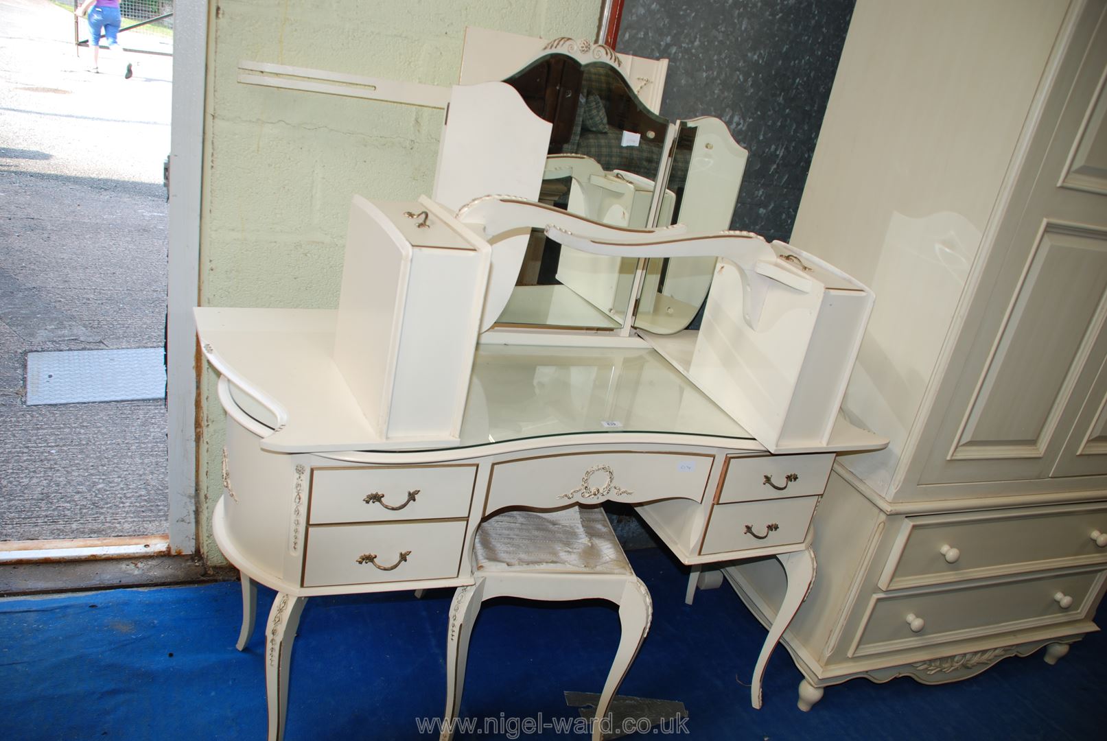 Kidney shaped dressing table with tryptic mirror, stool,