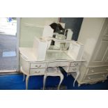 Kidney shaped dressing table with tryptic mirror, stool,