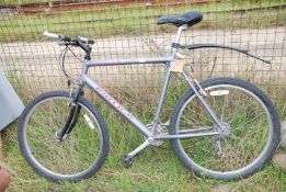 A "Raleigh Max" mountain bicycle with Shimano 14 speed derailleur type gears and "Shimano V" brakes.