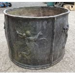 A heavy Lead Garden Planter 12" x 17" diameter the six panels moulded with depictions in relief of