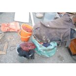 Quantity of equestrian items: buckets, hay nets and rug.