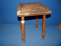 A small hand carved side table inscribed 'Kenchester' underneath, top 11'' x 10 1/2''.