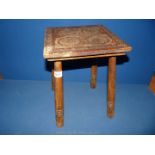 A small hand carved side table inscribed 'Kenchester' underneath, top 11'' x 10 1/2''.