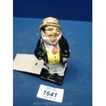 A Royal Doulton figure 'Captain Cuttle'.