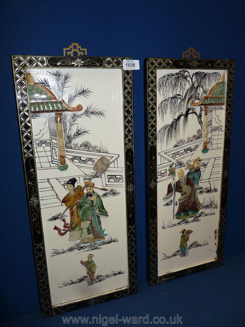 Two Japanese Panels, decorated with figures and black border, 24" x 10".