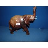 A carved African elephant, 11 high.