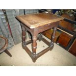 An Oak peg joyned Stool having solid seat and turned legs with perimeter stretchers,
