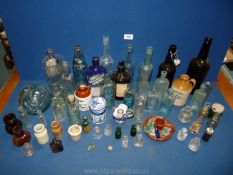 A large quantity of glass bottles and some pots, bottles to include Holbrook & Co,