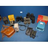 Miscellaneous cameras and binoculars to include an Ensign box camera, boxed Brownie Reflex,