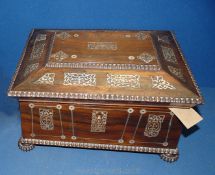 A Victorian Rosewood sewing box with mother of pearl inlay, original fitted interior, with key.