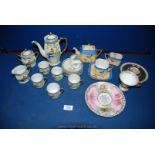 A 1930's Japanese porcelain coffee set and Japanese porcelain Tea for One set comprising teapot cup