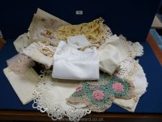 A tray of linen tablecloths, napkins, crochet pieces, lace work etc.
