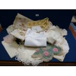 A tray of linen tablecloths, napkins, crochet pieces, lace work etc.