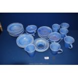A quantity of Brannon pottery tea and dinner ware including mugs, saucers, bowls, posy vase,