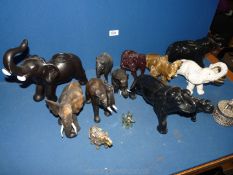 A quantity of Elephant figures in wood, onyx, ceramic, etc., (some a/f).