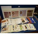 A quantity of souvenir stamps in folders,