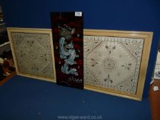 Two framed embroidered panels with silver thread work to the edge and floral centre,