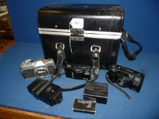 A Mamiya/Sekor 500TL Olympus AF-10 camera body, housed in large black camera case.