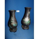Two oriental lightweight Vases, with oriental design, and incorporating bases,