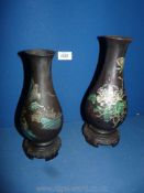 Two oriental lightweight Vases, with oriental design, and incorporating bases,