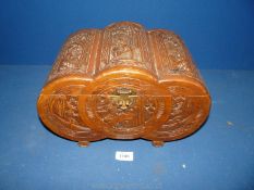 A small carved Chinese camphorwood box.