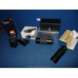 A Vivitar 285 zoom Thyristor automatic flash, a Sigma 75-300 zoom lens in new case and box,
