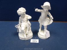 A pair of Blanc De Chine figurines of a boy, 6'' (chip to bird) and girl,