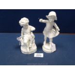 A pair of Blanc De Chine figurines of a boy, 6'' (chip to bird) and girl,